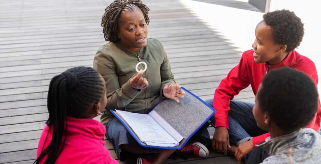 Female Children learning about the DPV ring