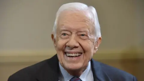 Jimmy Carter, Former U.S. President and Humanitarian Icon, Dies at 100