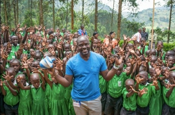 Twesigye Jackson Kaguri with children