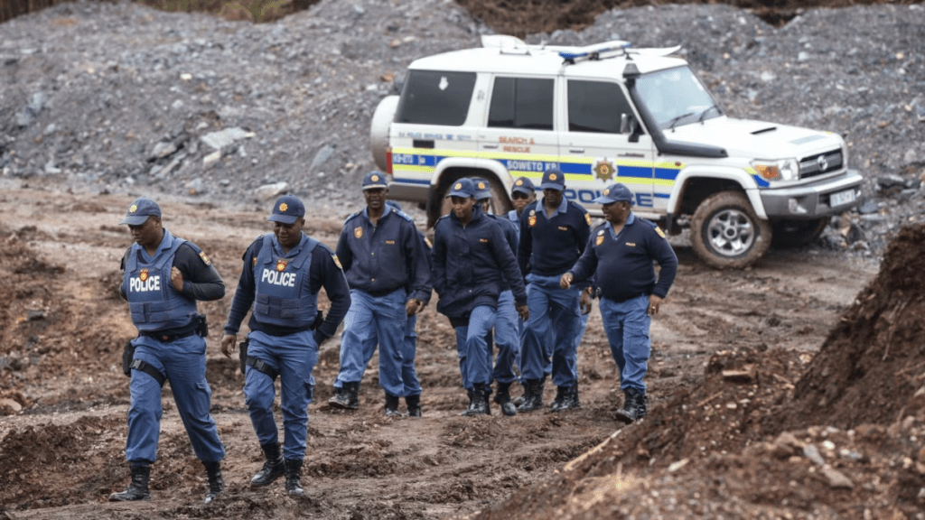 South African police probe deaths of 21 suspected illegal miners.