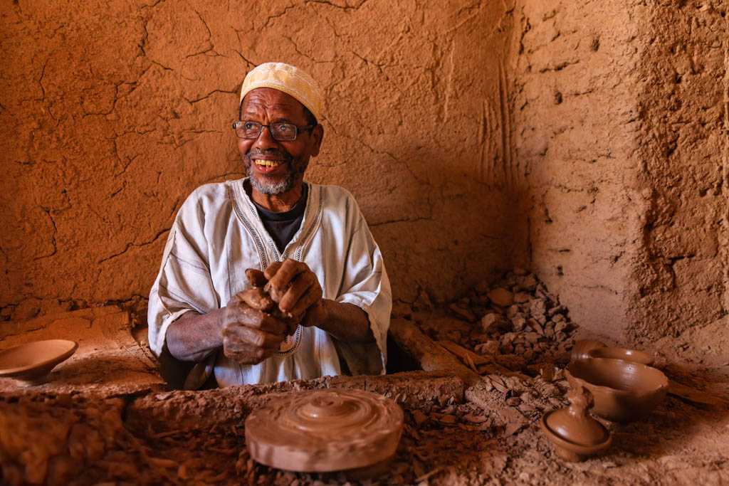 moroccan potter working in his workshop
